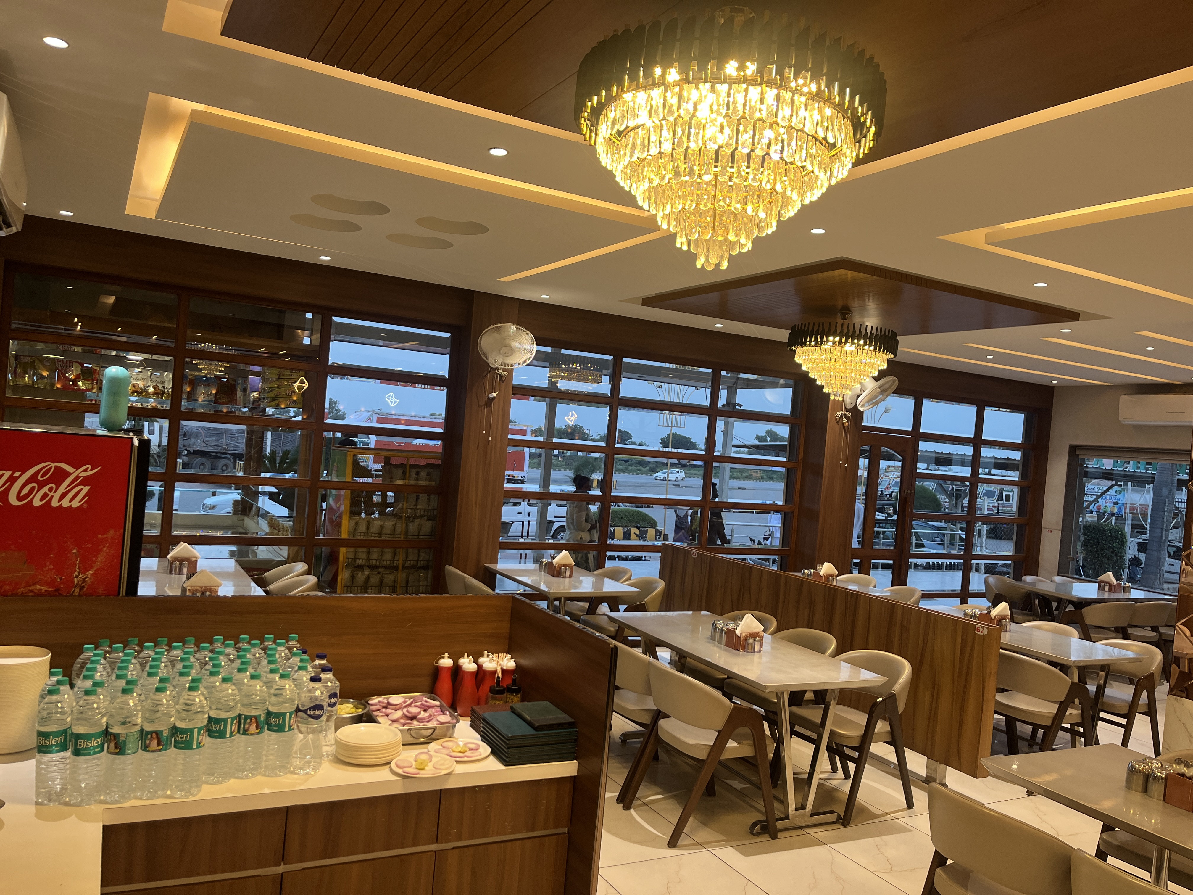 Warm wooden interiors of the restaurant at Hotel Green Plaza